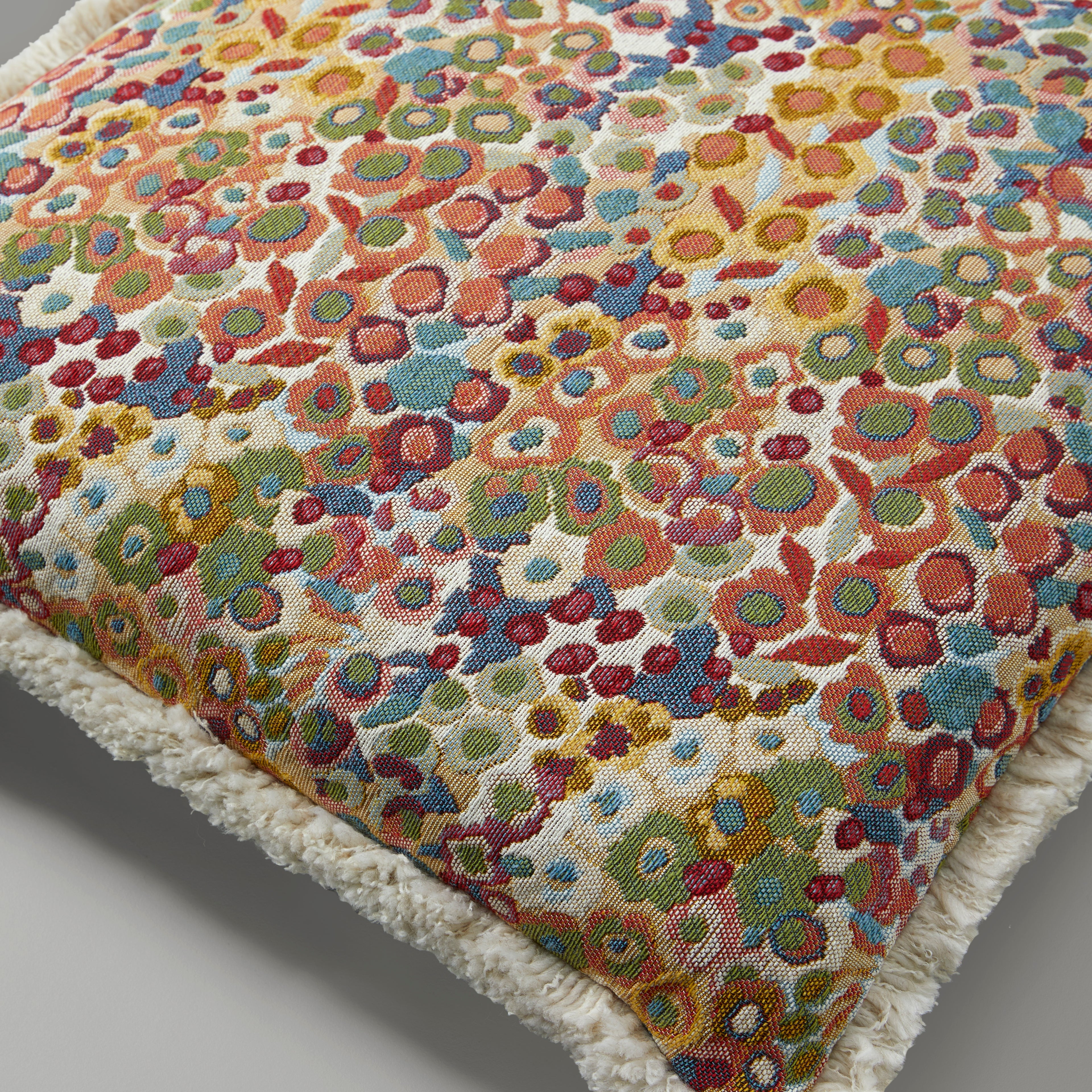 Alethe spring flower, fringe cushion